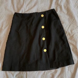 Mini skirt with gold details